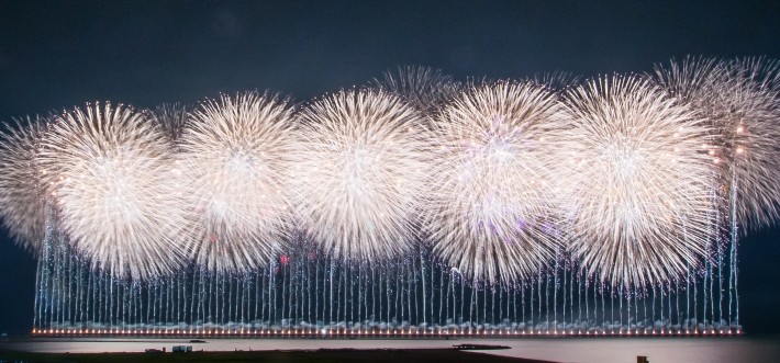 Gion Kashiwazaki Festival with large scale fireworks display over the ocean
